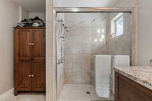 Main Level Living! Primary Bedroom. Beautiful slider leading to hot tub, and back deck. Primary Ensuite walk in closet. Enclosed Toilet room.