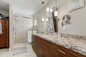 Main Level Living! Primary Bedroom. Beautiful slider leading to hot tub, and back deck. Primary Ensuite walk in closet. Enclosed Toilet room.