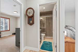 Main Level Living! Hallway off of living room to bedroom 2 and bedroom 3 and access to 3/4 bath.