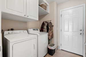 Main Level Laundry Room and access to attached 2 car garage.