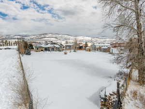 Bird's eye view of this 1.25 acre property. Stunning VIEWS! Gorgeous Rambler/Ranch home. Massive detached garage/shop. Beautiful Landscaping. Mature Trees. VIEWS!