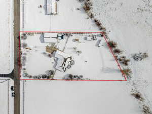 Bird's eye view of this 1.25 acre property. Stunning VIEWS! Gorgeous Rambler/Ranch home. Massive detached garage/shop. Beautiful Landscaping. Mature Trees. VIEWS!