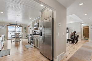 Main Level Living! Updated Kitchen. Gorgeous Hardwood flooring. Stainless Steel Appliances. Farmhouse Sink. Beautiful ceiling w/ can lights!