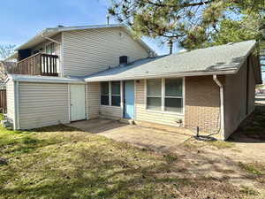South front doorway, roof shingles, lawn yard,  storage area, ramp, brick & siding.