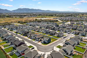Aerial view of residential area featuring mountains