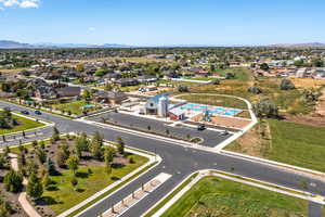 Aerial perspective of suburban area featuring a mountain backdrop