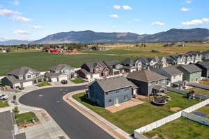 Aerial view of residential area with a mountain backdrop
