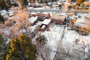 Snowy aerial view with a residential view