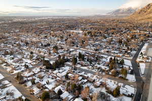 Aerial view of property's location featuring nearby suburban area