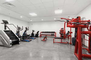 Exercise room with a paneled ceiling