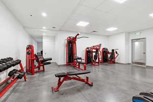 Exercise area featuring a paneled ceiling