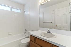 Full bathroom featuring vanity and tub / shower combination