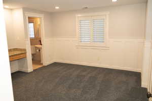 Basement 4th bedroom with convenient private bathroom.