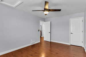 Unfurnished bedroom featuring LVP flooring, ceiling Fan