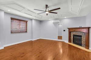 Unfurnished living room  LVP Flooring, a fireplace, a ceiling fan, and recessed lighting