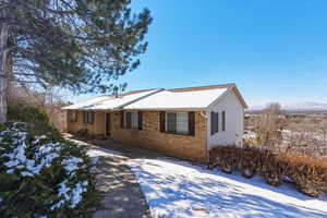 View of front facade with brick siding