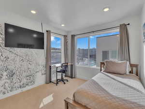 Bedroom featuring carpet and recessed lighting