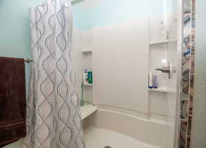 Full bathroom with a stall shower
