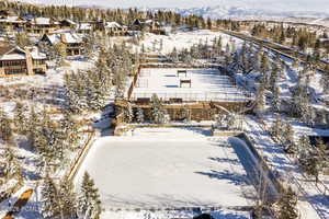 Snowy aerial view with a mountain view