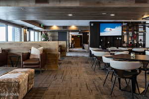 Dining room with wooden walls