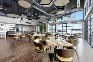 Common area with a high ceiling