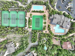 Aerial overview of property's location with a pool area