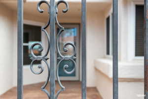 Entry exterior view through gate detail