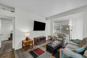 Living area featuring wood finished floors