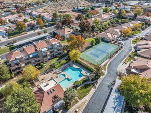 Aerial view of residential area featuring a pool