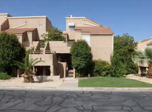 View of front facade featuring stucco siding
