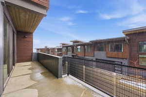 Balcony featuring a residential view