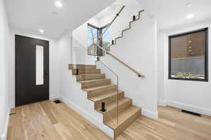 Entrance foyer featuring light wood-type flooring and recessed lighting