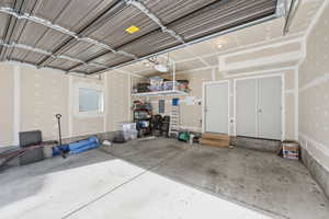 Garage featuring electric panel