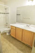Full bath featuring vanity and shower / bathtub combination