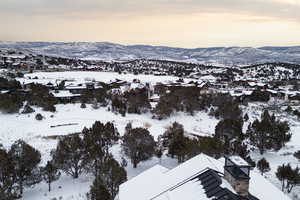 Snowy aerial view with a mountain view