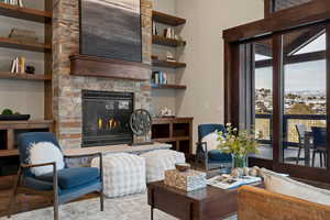 Living area featuring a fireplace and wood finished floors