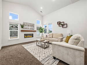 Great room with vaulted ceilings and cozy fireplace.