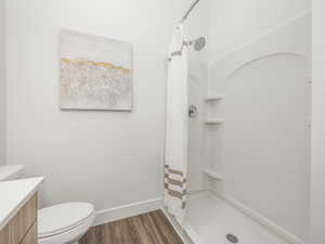 Primary en' suite with double vanity and walk in shower.