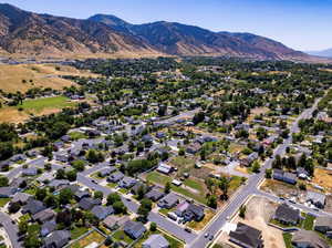 Aerial view of residential area with a mountainous background