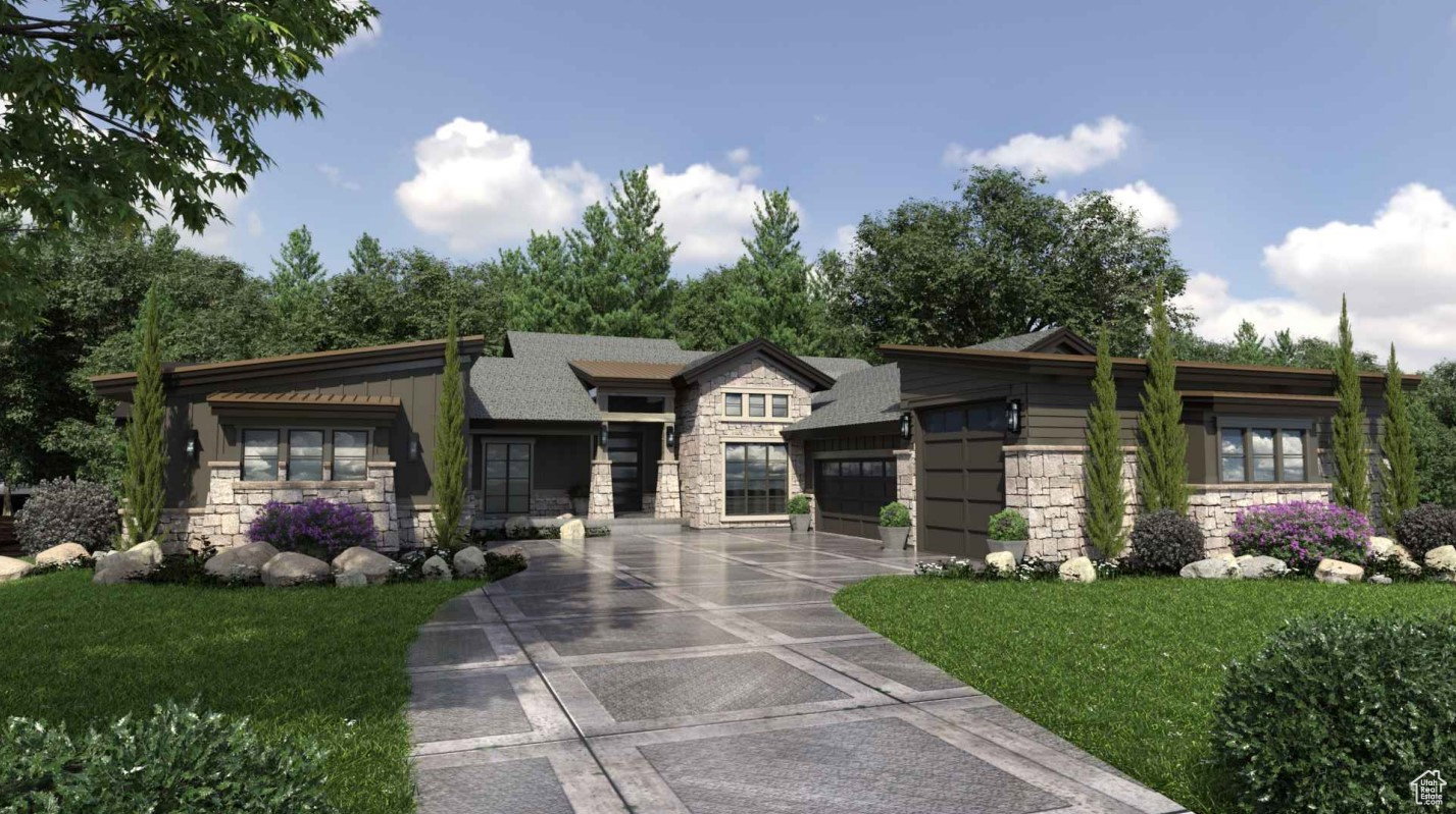 View of front of property with stone siding and a front yard