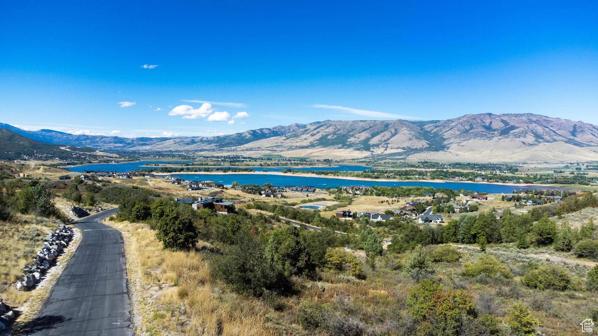 View of mountain background with a nearby body of water