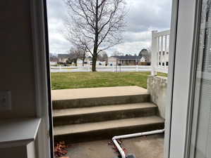View of grassy yard with a residential view