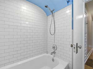 Bathroom featuring tub / shower combination