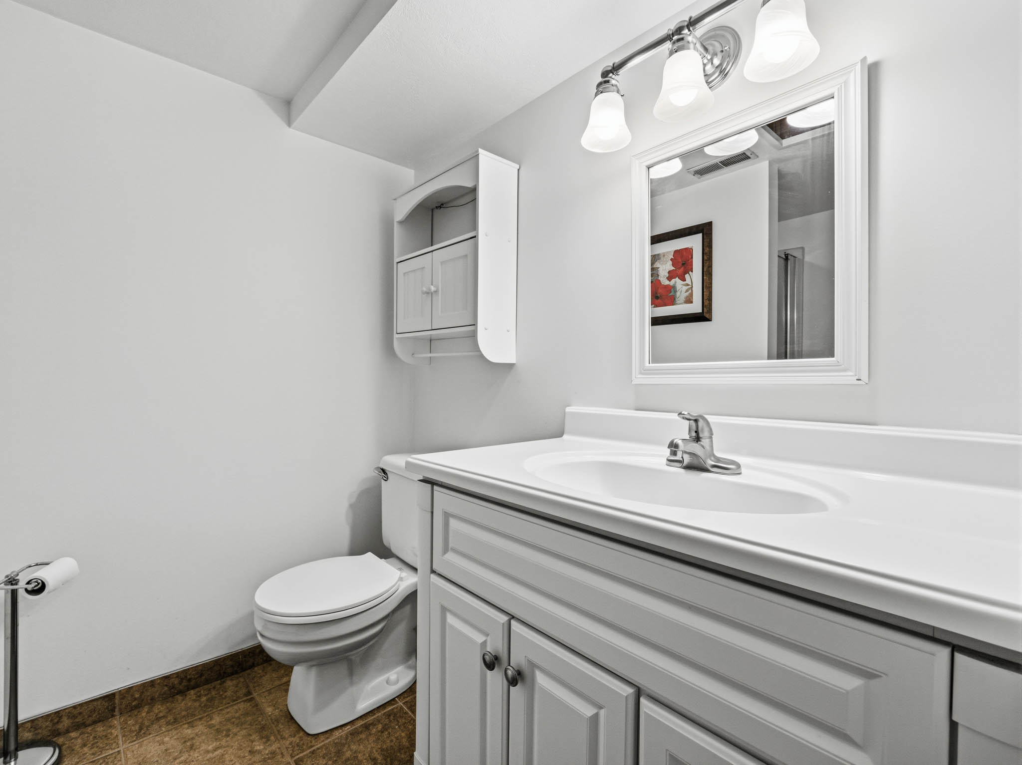 Bathroom with toilet and vanity
