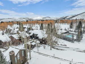 Snowy aerial view with a mountain view
