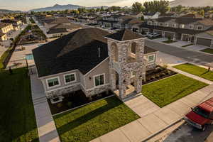 Aerial view at dusk of a residential view and a mountain view
