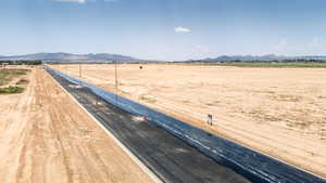 View of yard featuring a mountain view and a rural view