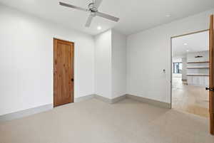 Unfurnished room with light colored carpet, recessed lighting, and ceiling fan