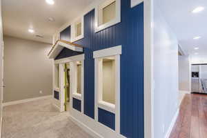 Corridor featuring recessed lighting