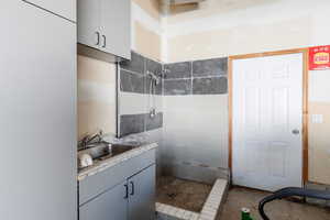 Bathroom featuring a stall shower and vanity